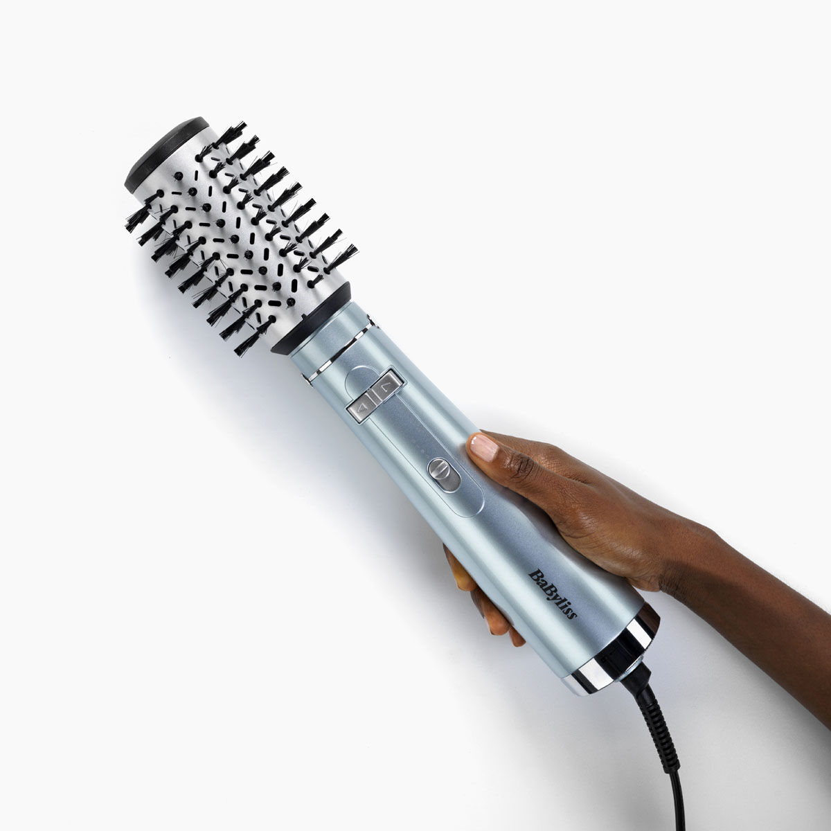 Hydro-Fusion Hot Air Styler w ręku